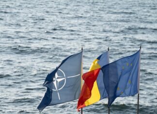 Ce relevă rolul României în conflictul cu Iranul privind poziționarea sa diplomatică?